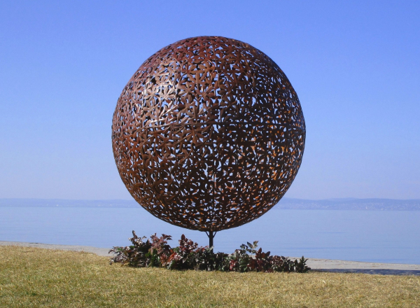 Big rusty ball garden park